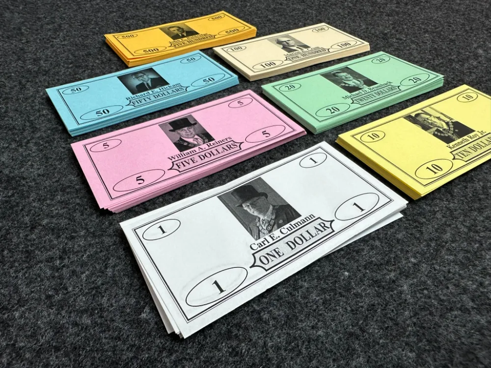 Custom play money in seven denominations, each carrying its own sponsor