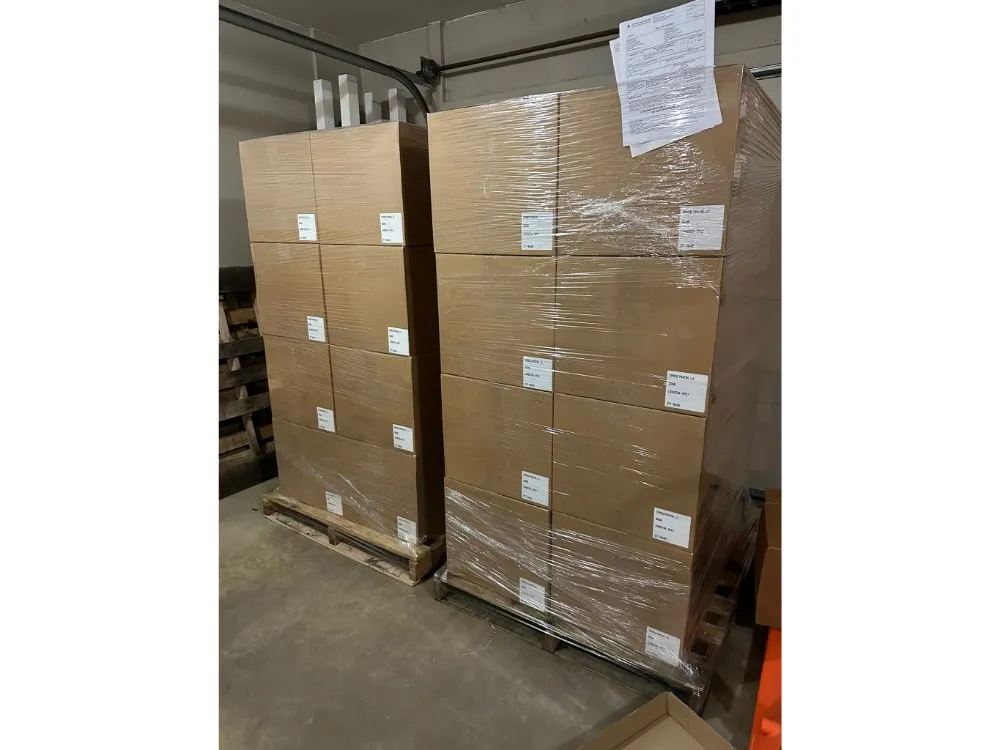 Pallets of finished Townopoly games shrink-wrapped and ready to ship